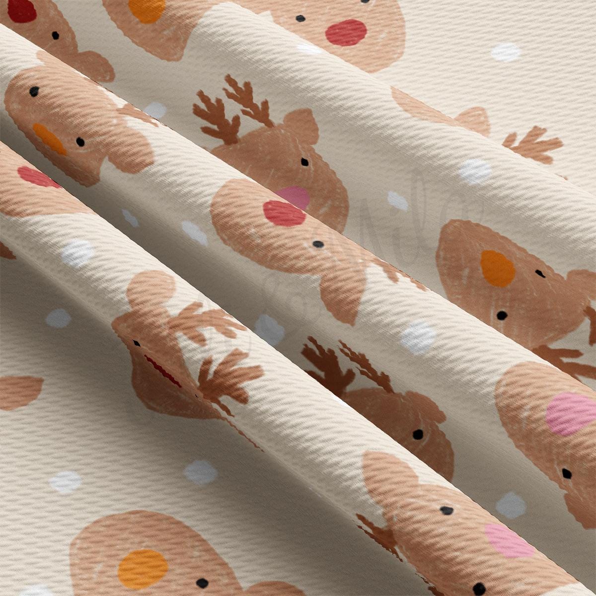 a close up of a wrapping paper with reindeers on it