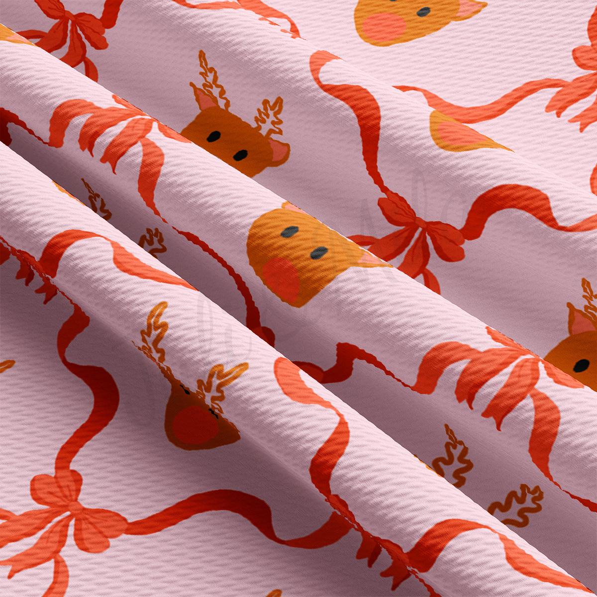 a close up of a pink background with red and orange designs