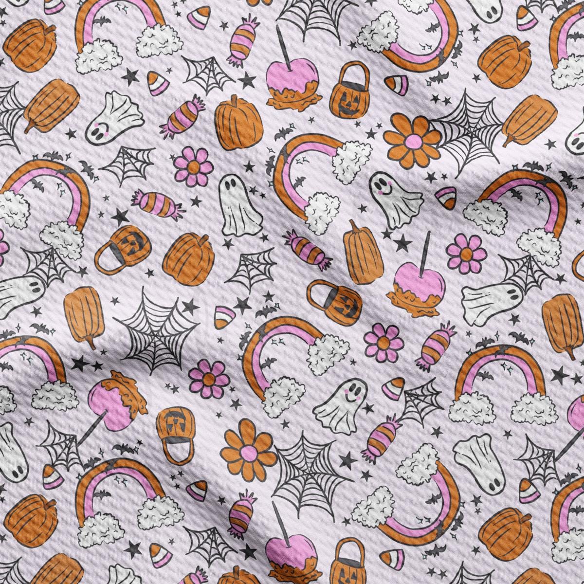 a white background with a pattern of halloween items