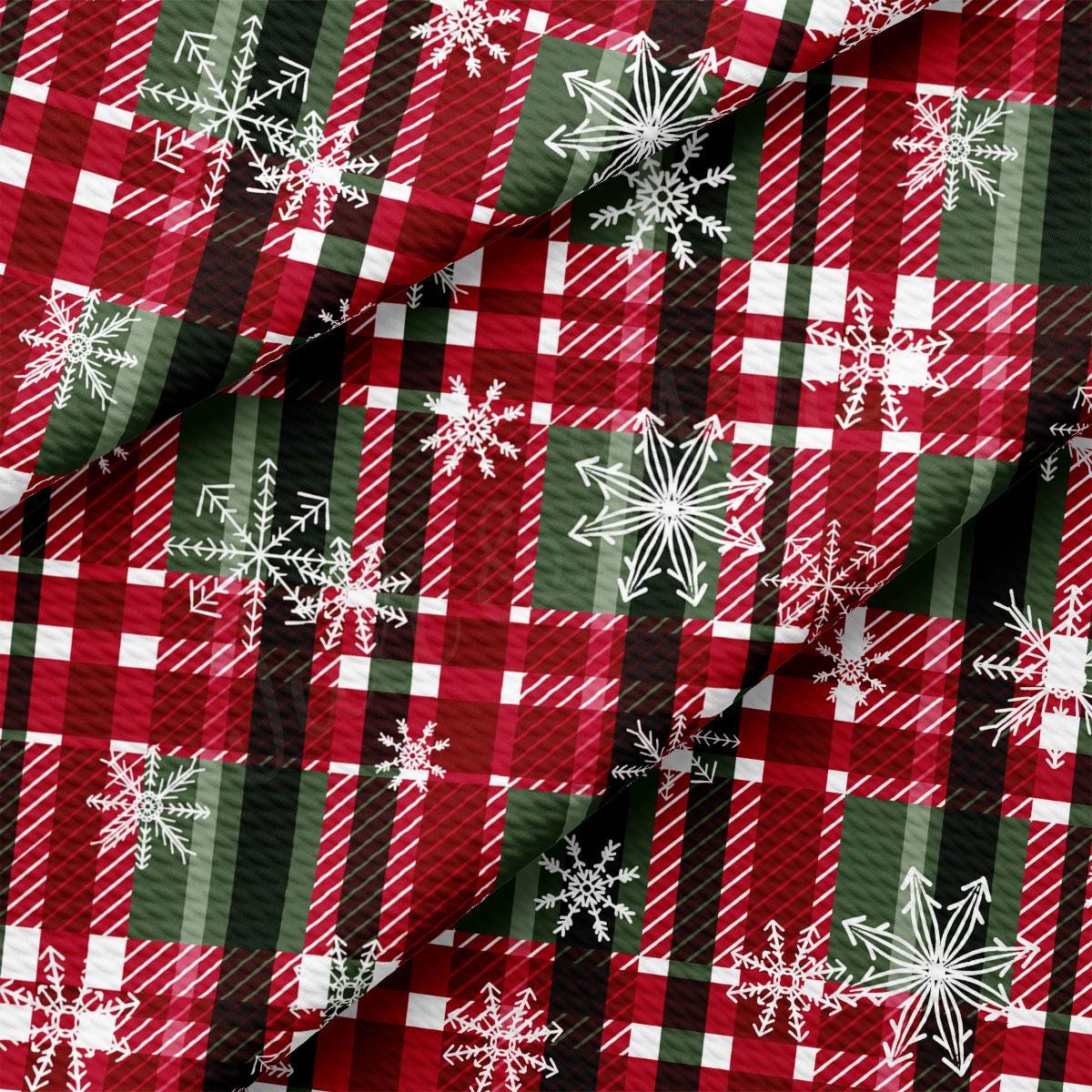 a plaid fabric with snowflakes on it