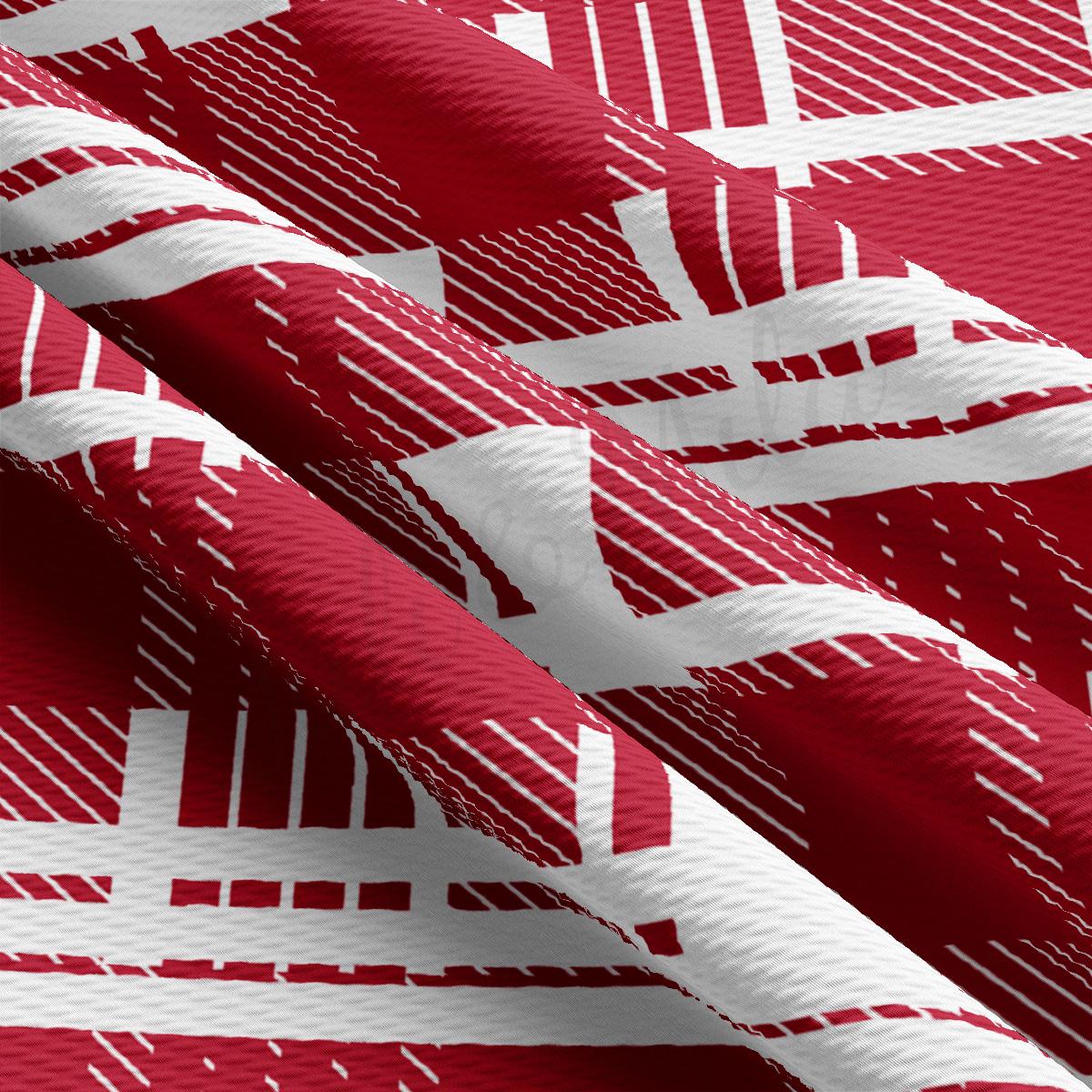 a close up of a red and white fabric