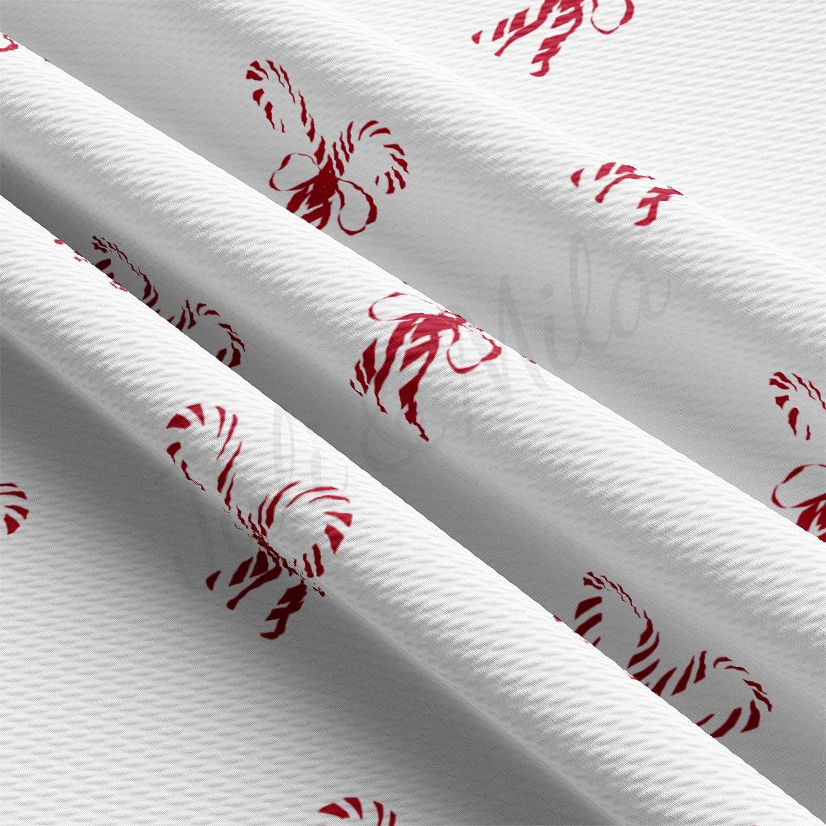 a close up of a white and red curtain