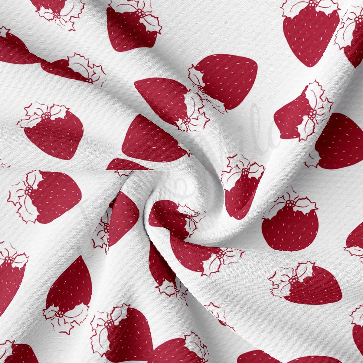 a white and red fabric with strawberries on it