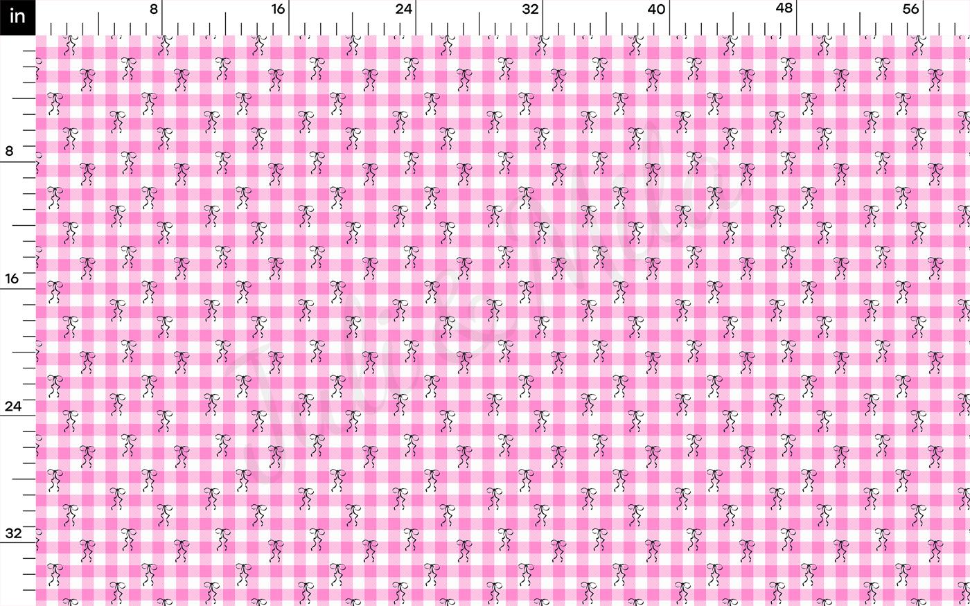 a pink and white checkered pattern with a ruler