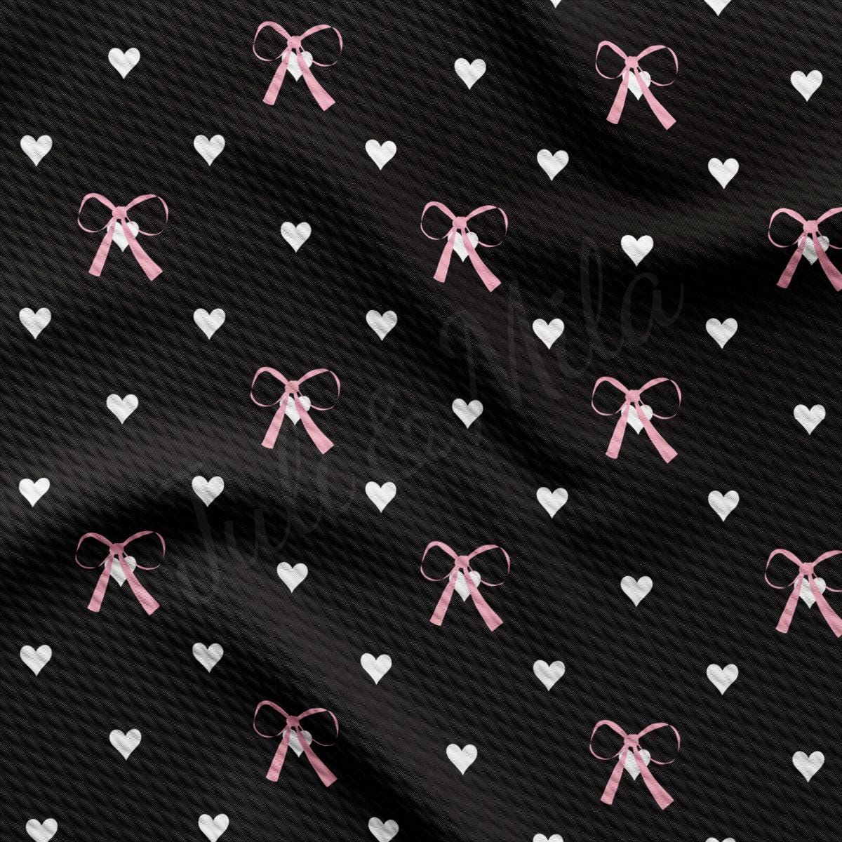 a black background with white hearts and pink bows