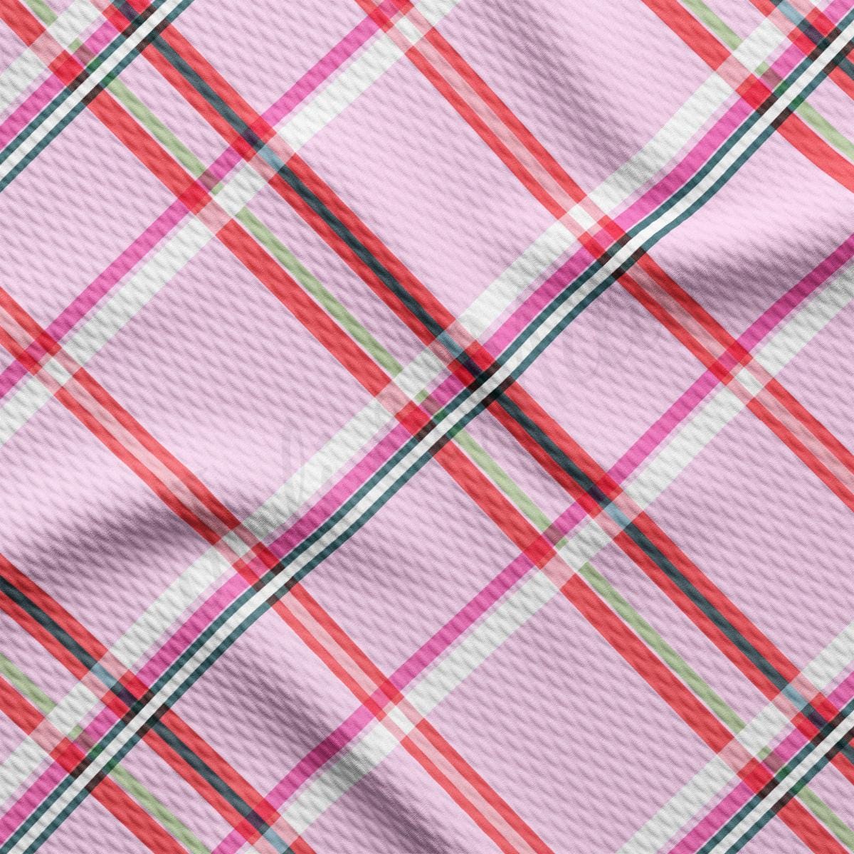 a close up of a pink plaid fabric