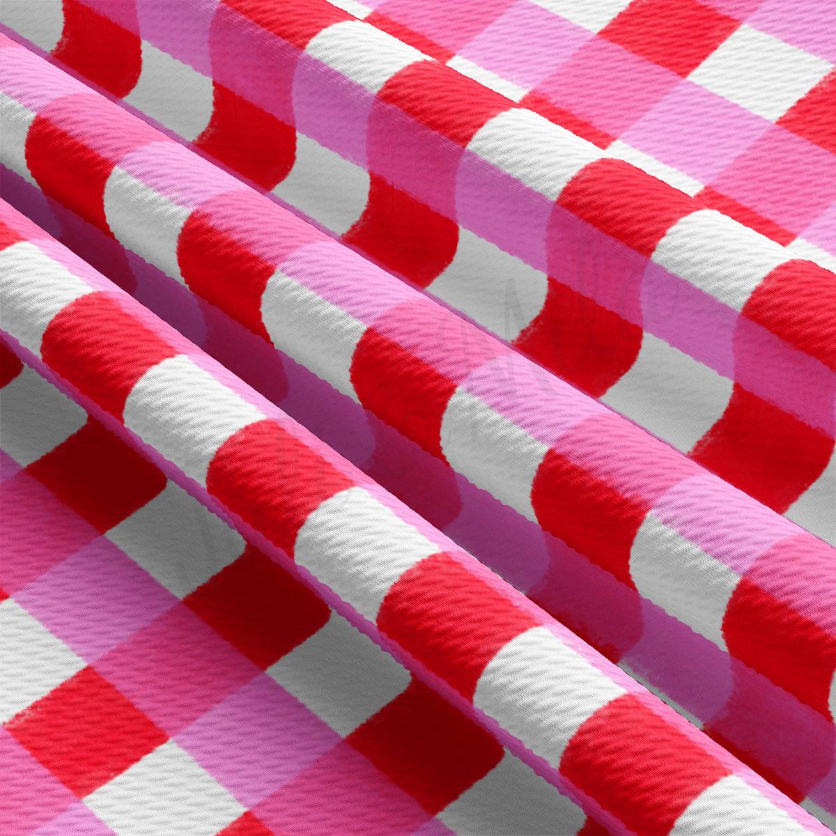 a pink and white checkered table cloth