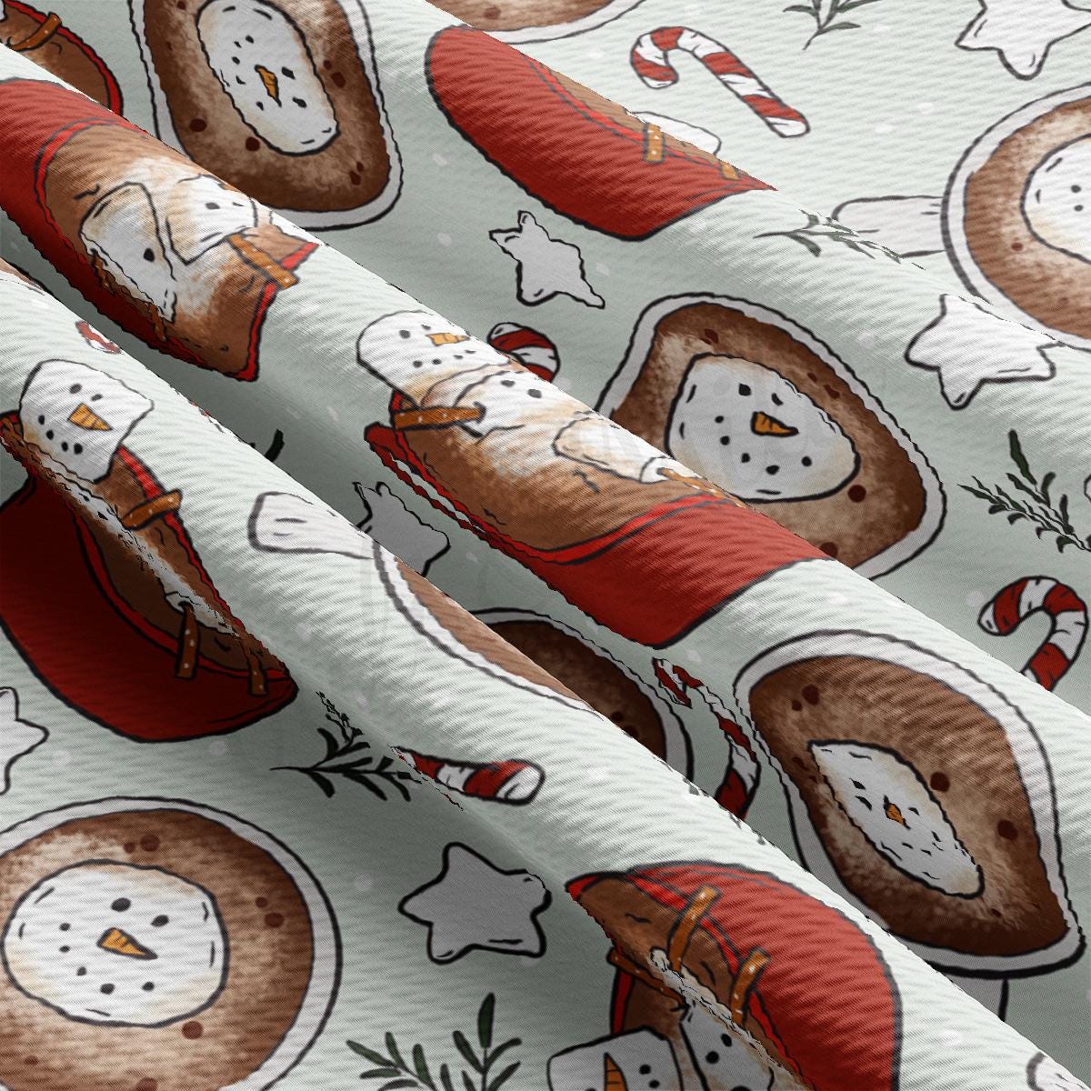 a close up of a wrapping paper with a pattern of snowmen