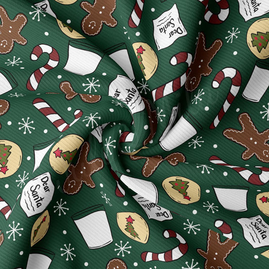 a close up of a green christmas themed fabric