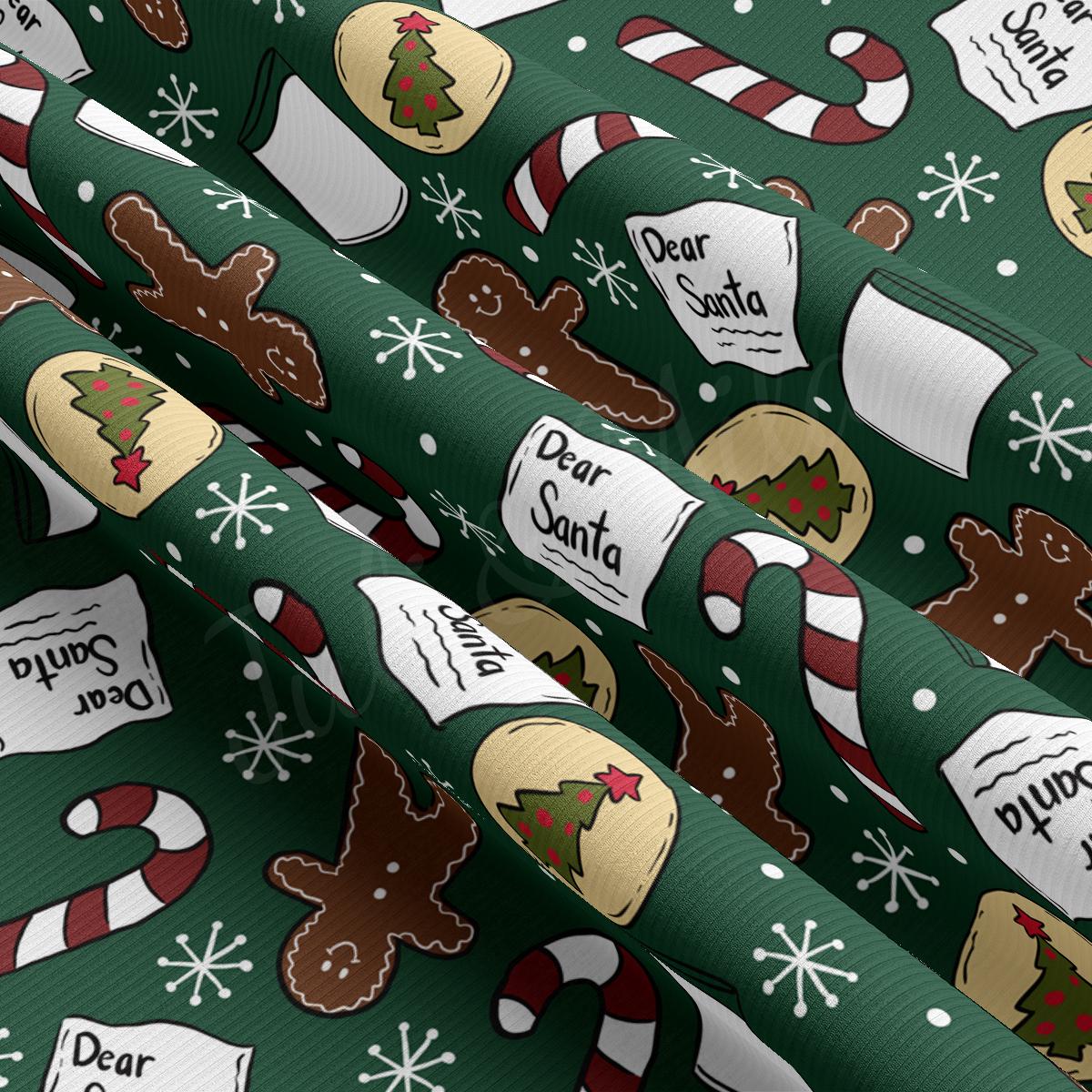 a green wrapping paper with a christmas theme