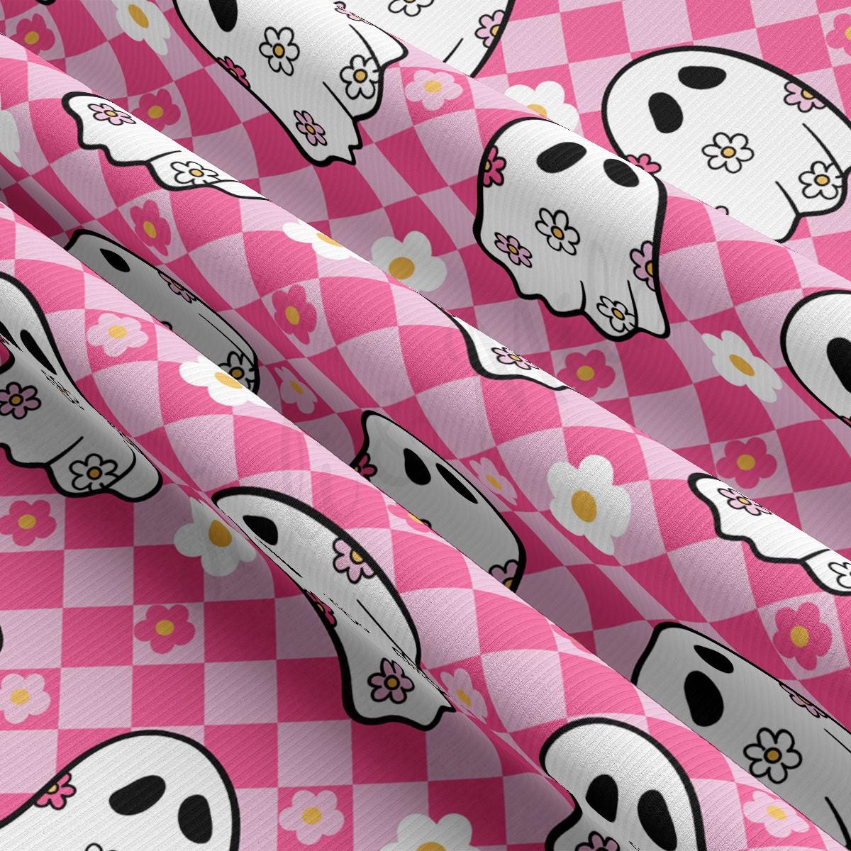 a pink and white checkered background with skulls and flowers