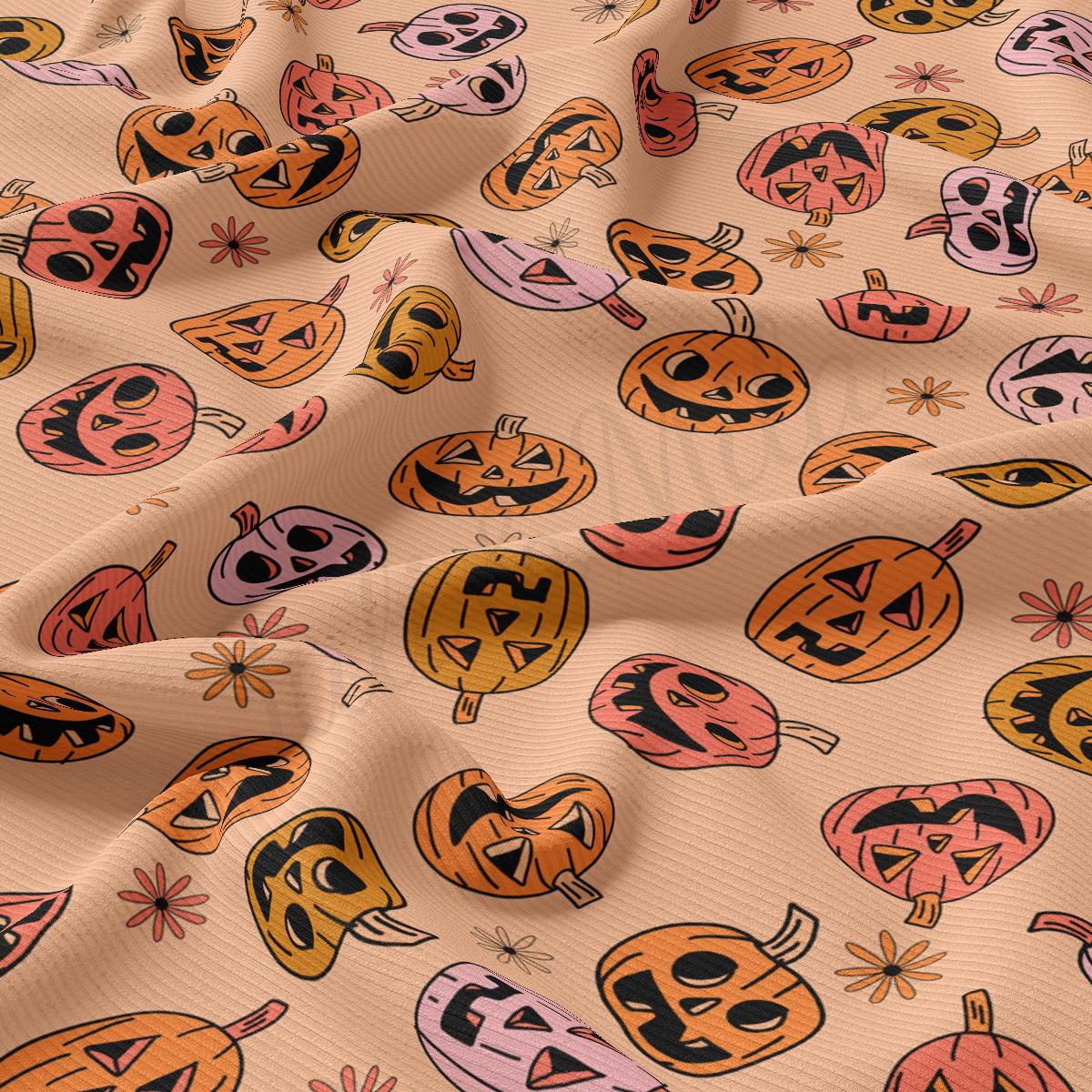 a close up of a pattern of pumpkins