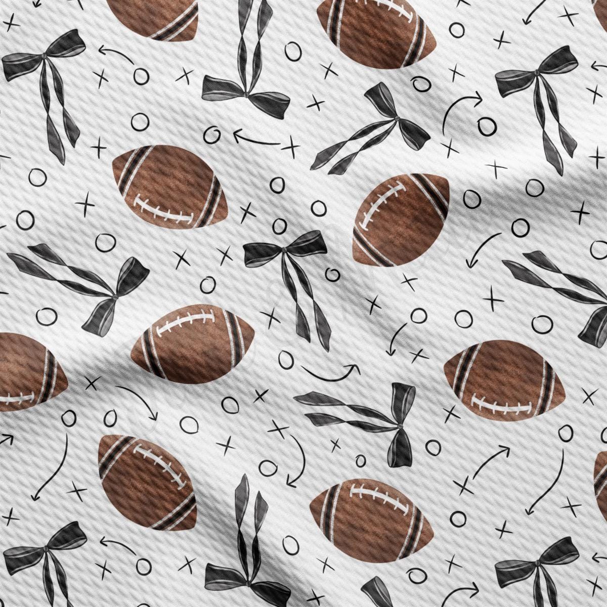 a pattern of footballs on a white background