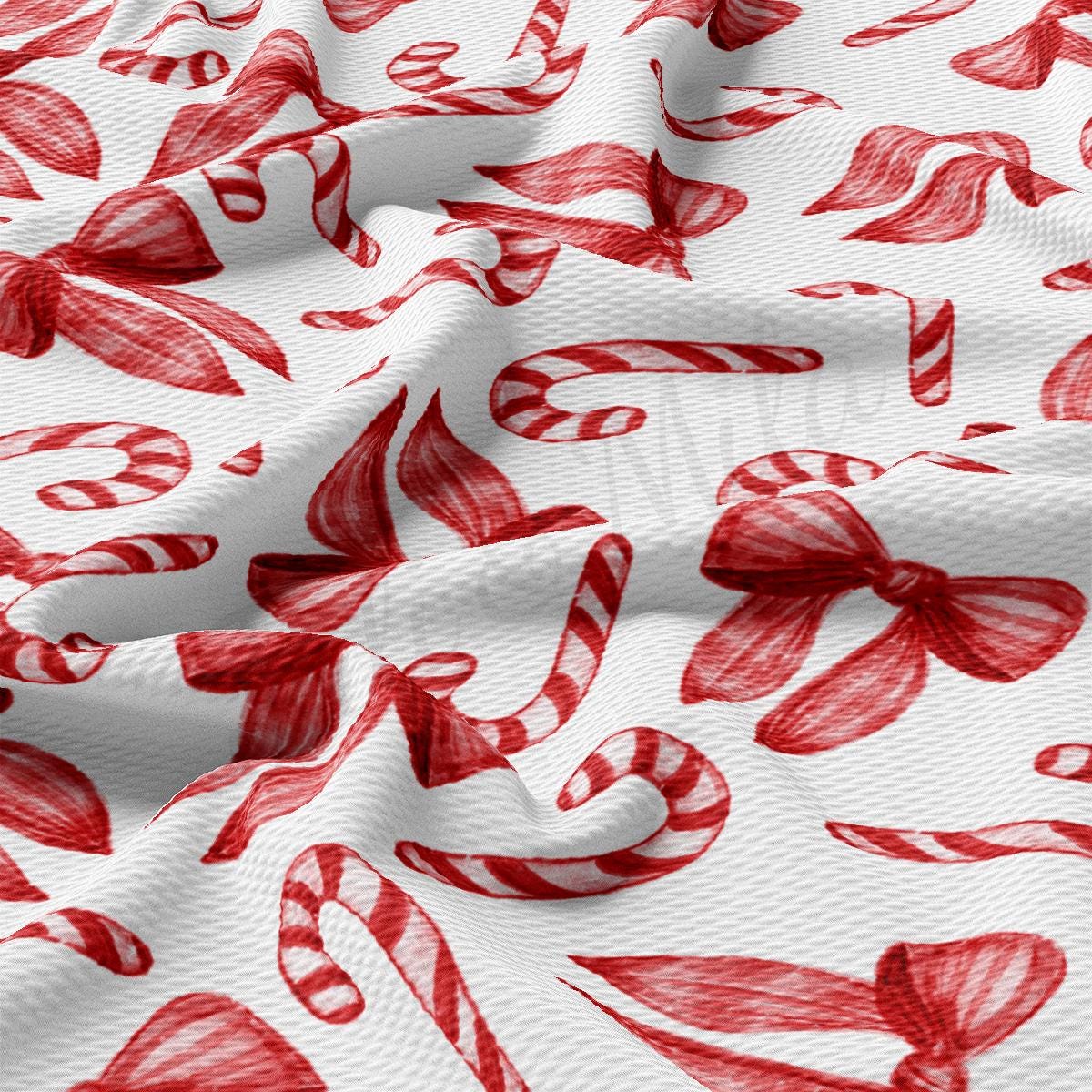 a close up of a red and white fabric