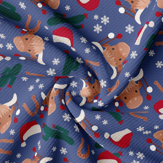 a blue background with a pattern of reindeers and snowflakes