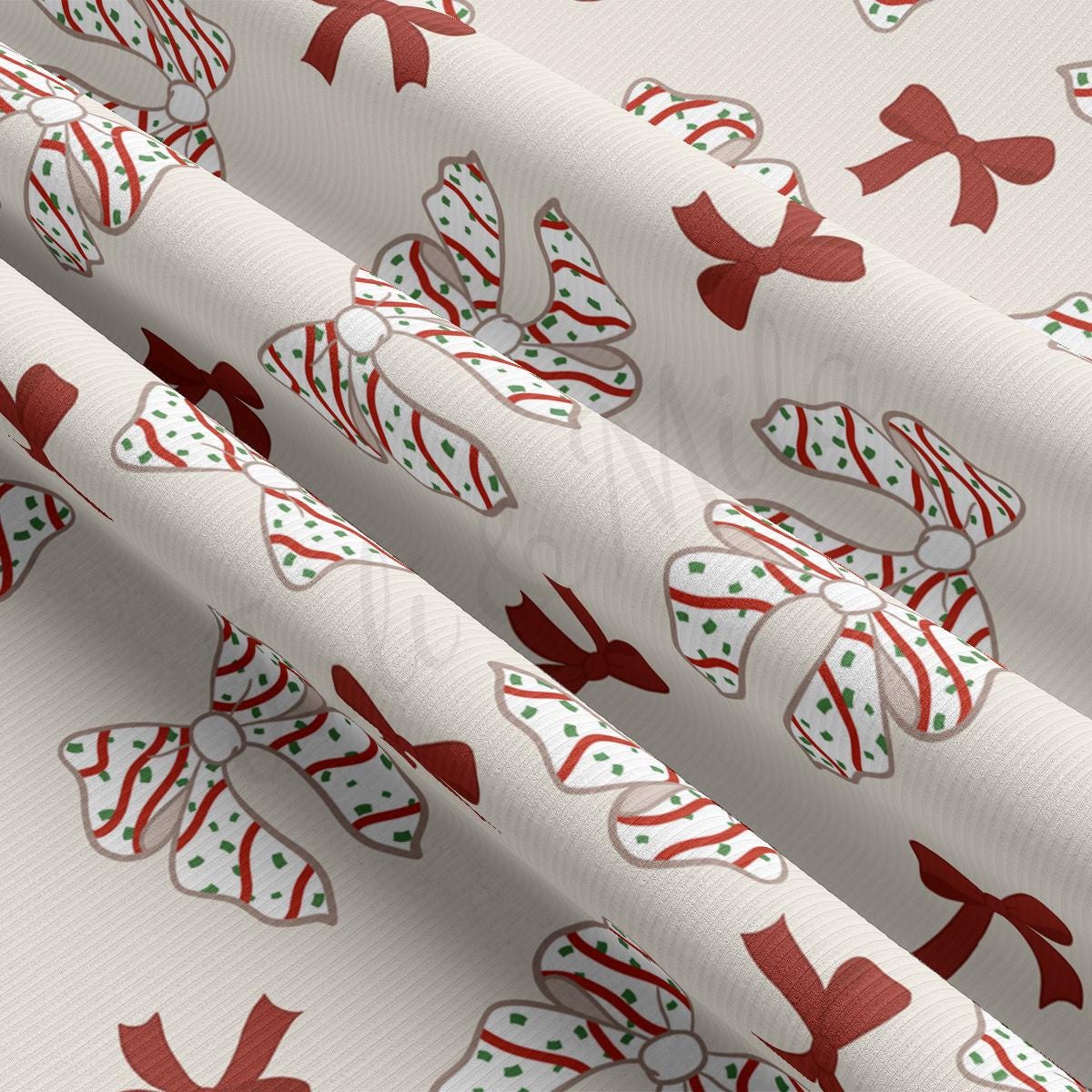 a close up of a wrapping paper with bows on it