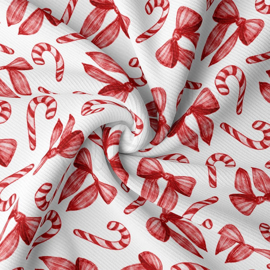 a close up of a red and white fabric