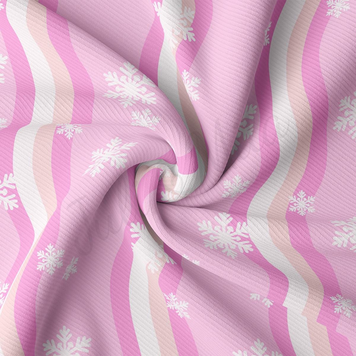 a pink and white striped fabric with snowflakes on it