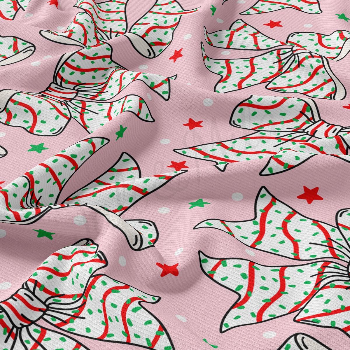 a pink background with a pattern of christmas trees