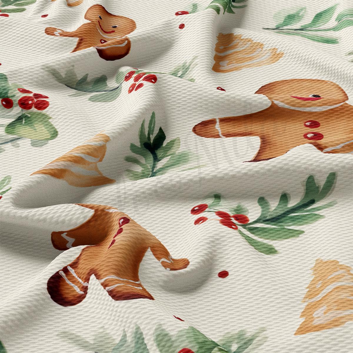 a close up of a white fabric with a christmas pattern