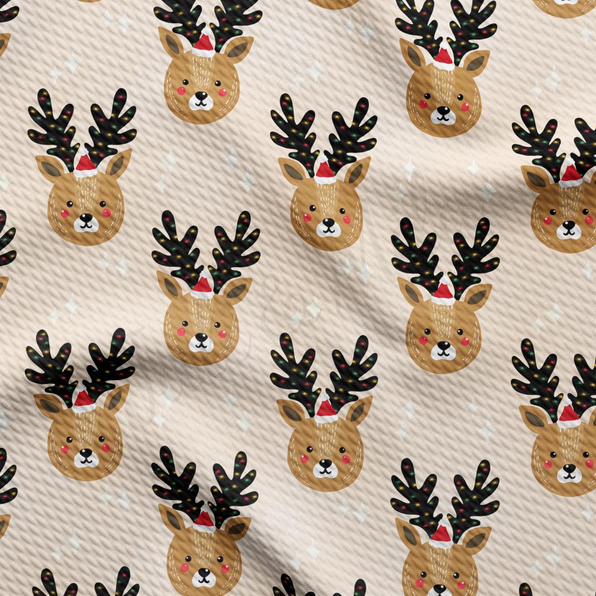 a close up of a pattern of deer with antlers