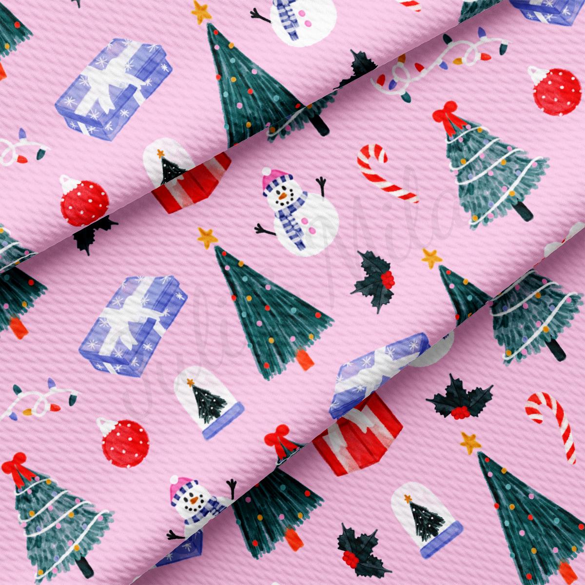 a pink background with christmas trees and presents