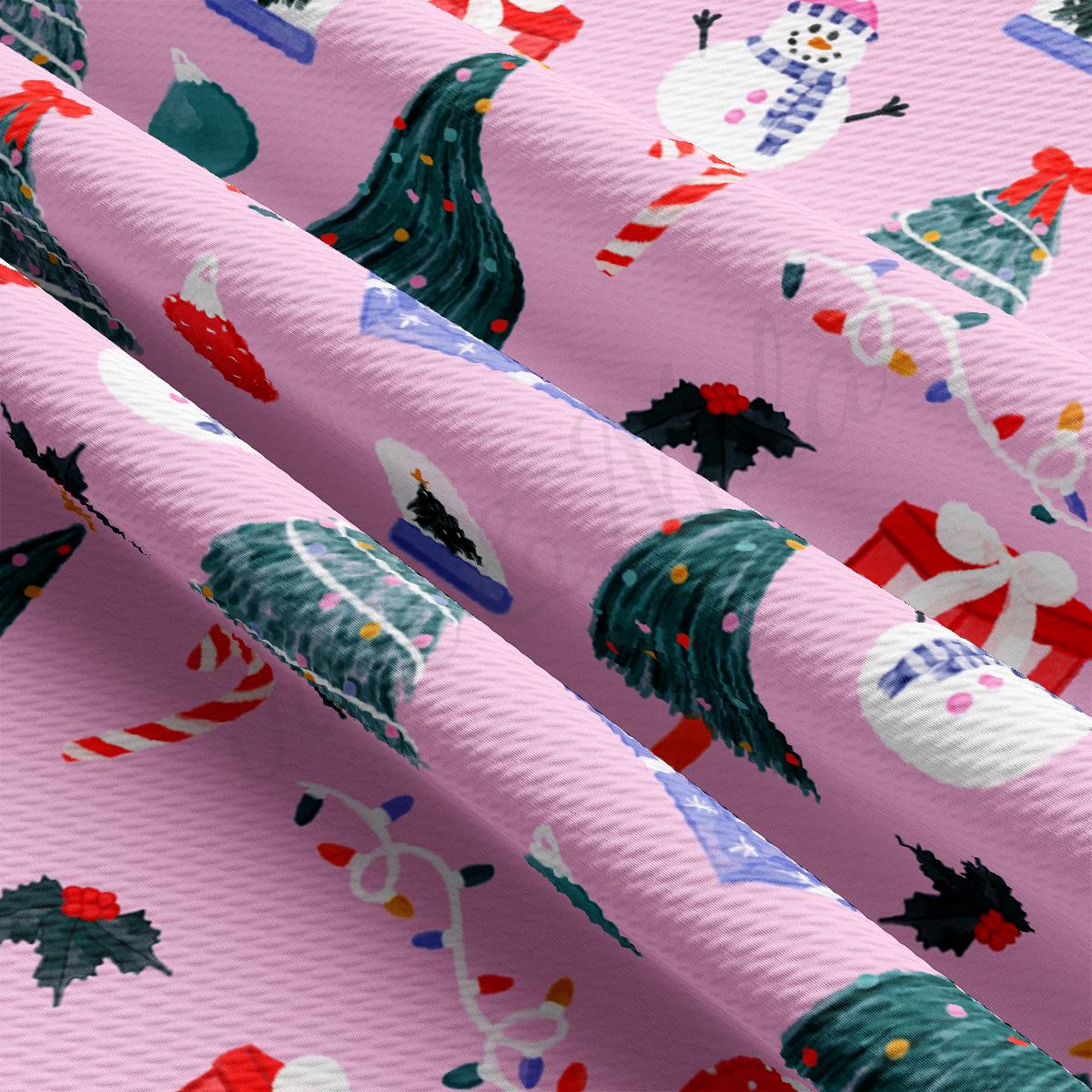 a pink wrapping paper with a christmas pattern on it