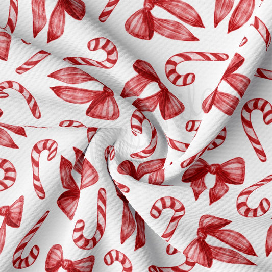 a close up of a red and white fabric