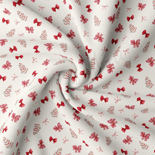 a red and white fabric with bows on it