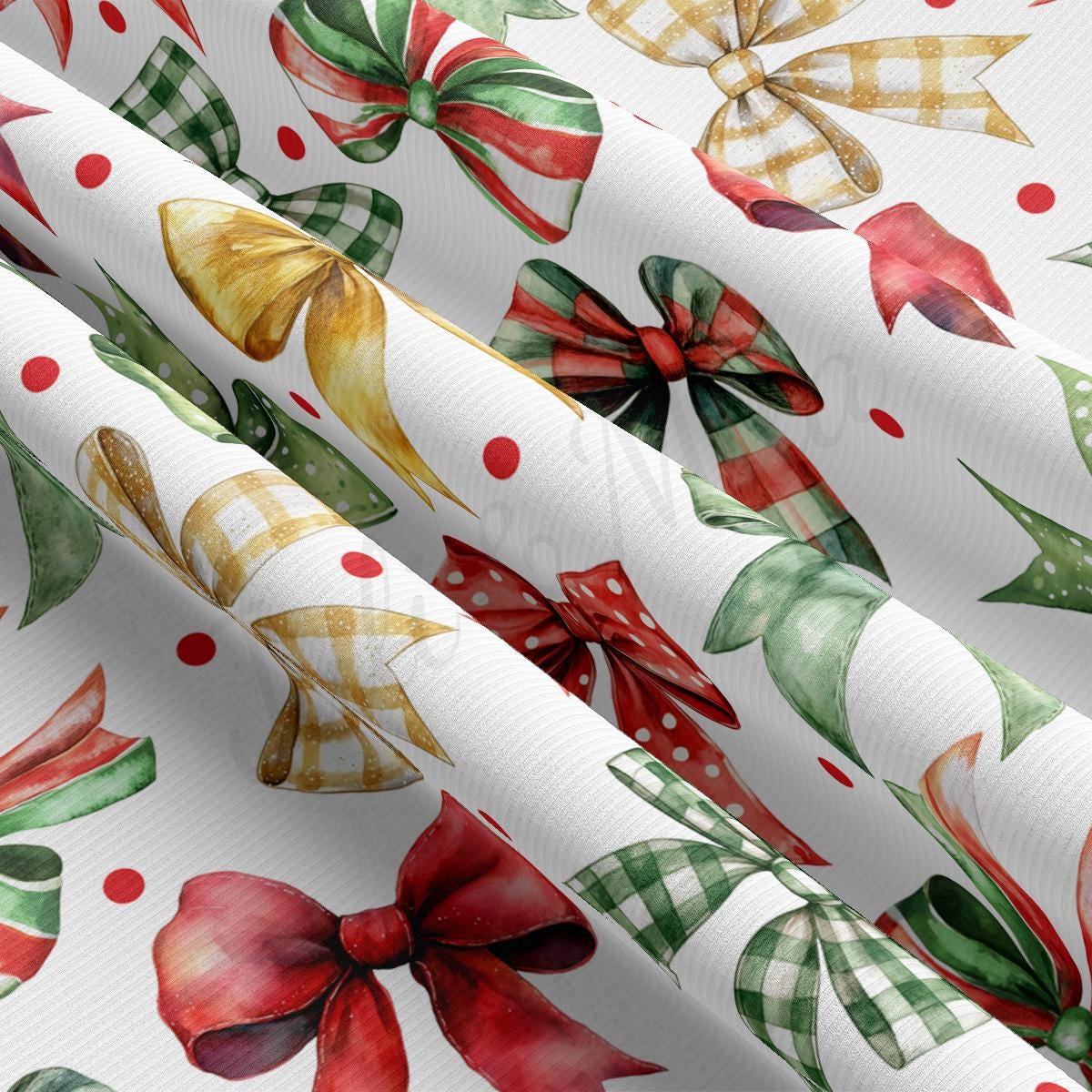 a close up of a white wrapping paper with bows on it