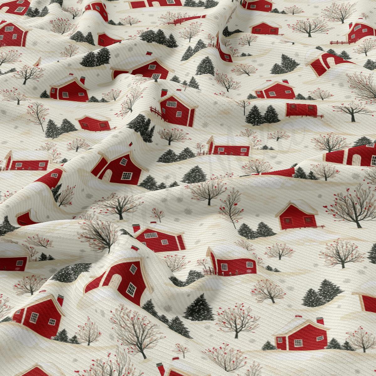 a red and white fabric with houses and trees on it