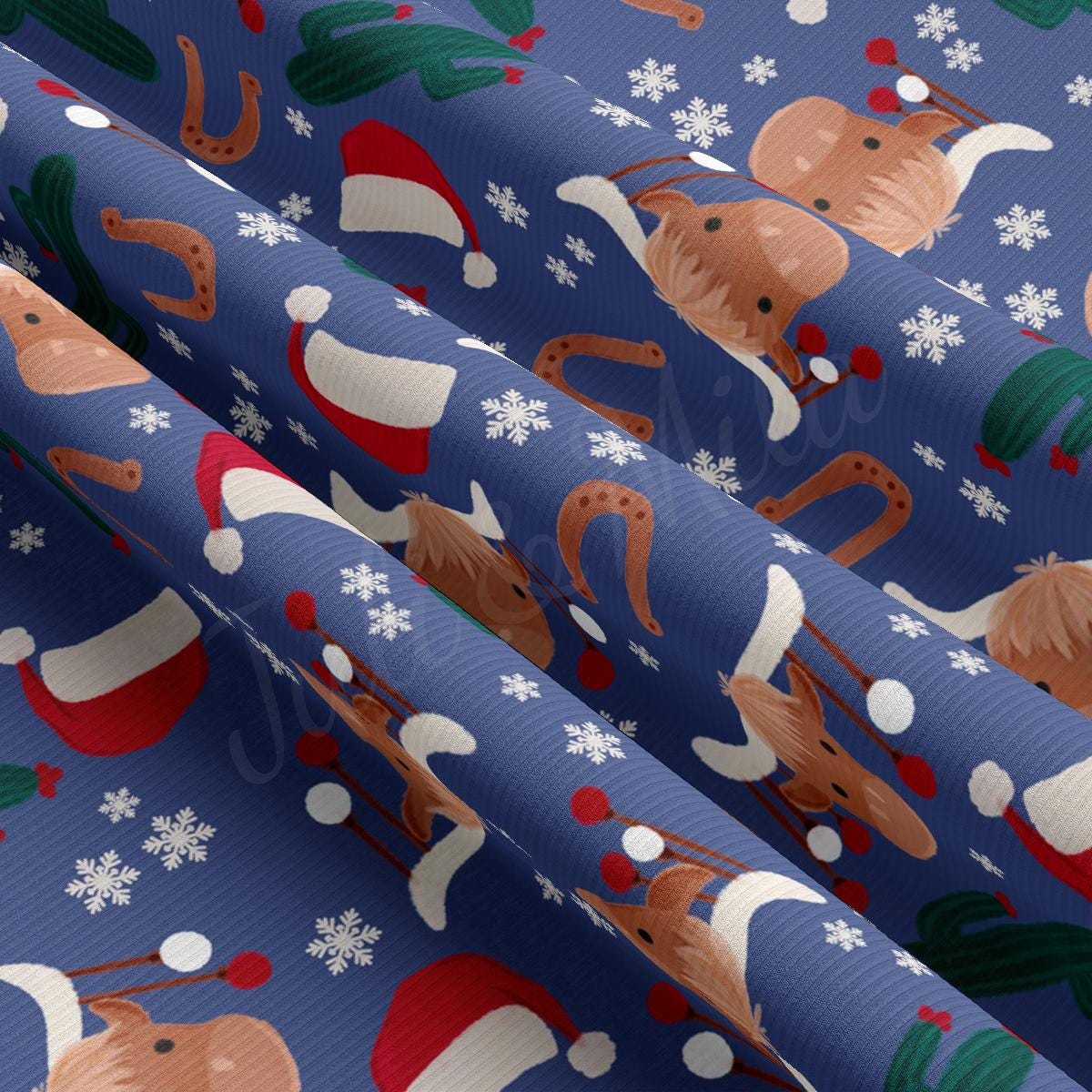 a blue christmas wrapping paper with dogs and snowflakes