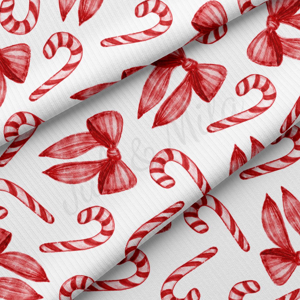 red and white candy canes on a white background