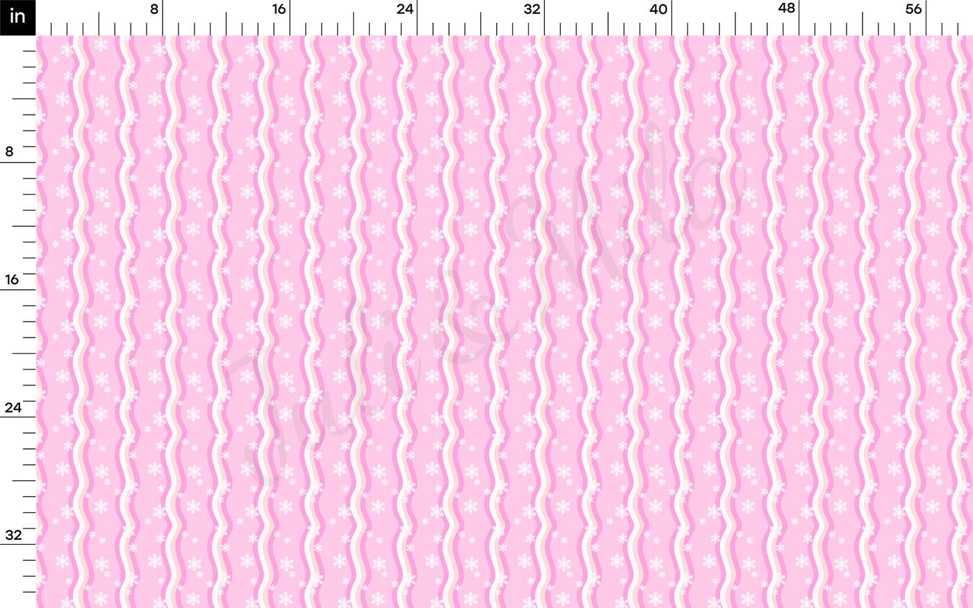 a ruler with a pink pattern on it